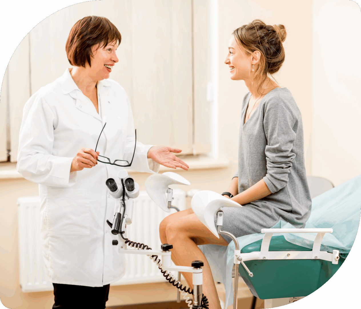 Doctor and patient in a gynecological office.